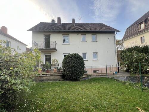 Gartenansicht - 6 Zimmer Mehrfamilienhaus, Wohnhaus zum Kaufen in Bad Oeynhausen