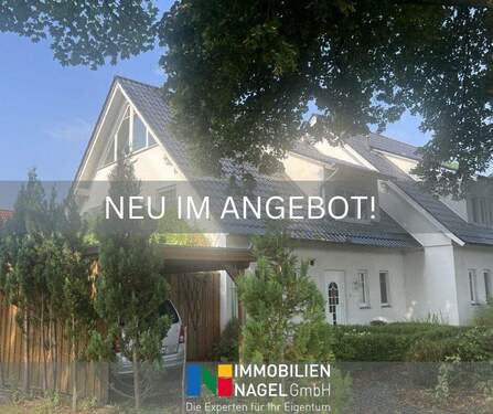 Neu im Angebot - Leben mit Stil: Doppelhaushälfte aus 2003 mit Terrasse und Carport in Hille-Hartum!