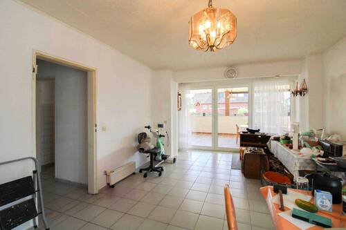 Wohnzimmer EG - 8 Zimmer Mehrfamilienhaus, Wohnhaus zum Kaufen in Münster