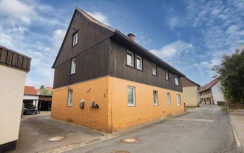 Objektansicht - Geräumiges Ein- bis Zweifamilienhaus in Langelsheim OT Wolfshagen - Garage, Carport und Werkstatt vorhanden