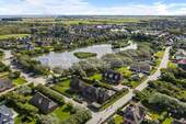 Luftbild - 7 Zimmer Einfamilienhaus zum Kaufen in Wenningstedt-Braderup