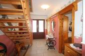 Der Flur mit dem Haupteingang - 