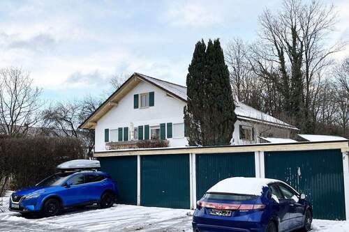 Ansicht Garagen - Mehrfamilienhaus, Wohnhaus in Ottobrunn zum Kaufen