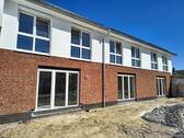 Gartenseite - Reihenmittelhaus mit 99,00 m&sup2; in Harpstedt zur Miete