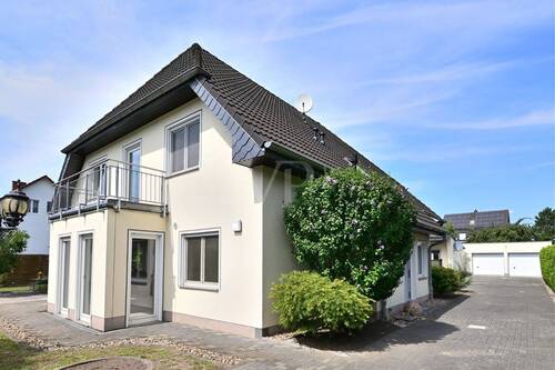 Exposetitelbild - 8 Zimmer Mehrfamilienhaus, Wohnhaus zum Kaufen in Falkensee