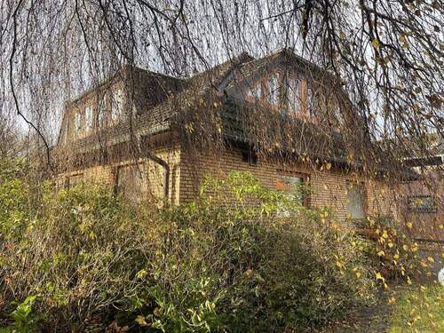 Seitenansicht - 5 Zimmer Einfamilienhaus in Schortens