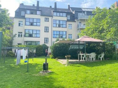 Bild 31 - Wohnung mit Garten: 3-Raum Wg. im DG, EBK, verglaster Balkon, großer Garten.