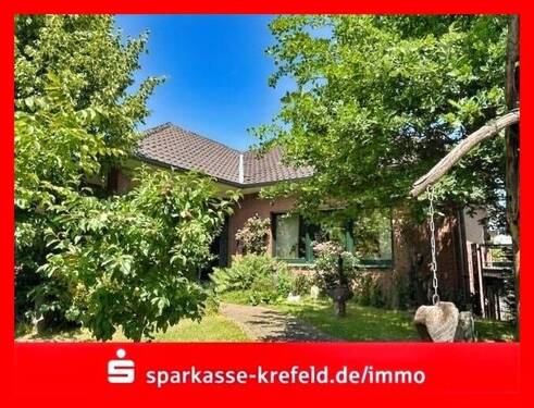 Vorderansicht - Winkelbungalow in Toplage - 649.000,00 EUR Kaufpreis, ca.  120,00 m² Wohnfläche