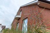 Fassade - Mittendrin im Grünen: Traumhaus mit vier Wohneinheiten am Park