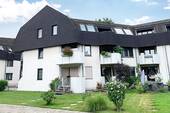 Hausansicht - Wohnung mit Wasserblick, drei Räumen und TG-Stellplatz
