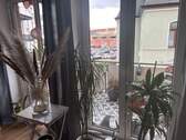 Wohnzimmer mit Balkon - 