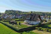 Seitenansicht Drohne - Einfamilienhaus mit 182,50 m&sup2; in Berkatal zum Kaufen