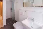 Bad mit ebenerdiger Dusche - 