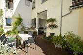 Charmanter und gemütlicher Hofbereich - Mehrfamilienhaus, Wohnhaus mit 223,20 m² in Mainz / Mombach zum Kaufen