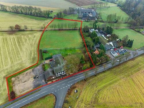 Luftaufnahme Landgasthaus - 1 Zimmer Mehrfamilienhaus, Wohnhaus zum Kaufen in Moers