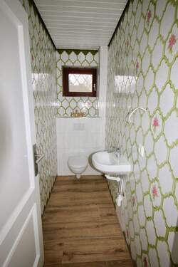 Gäste WC mit zauberhaften Fliesen - 