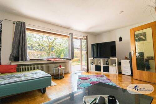 Wohnzimmer EG - Mehrfamilienhaus, Wohnhaus mit 254,00 m² in Aschau im Chiemgau zum Kaufen