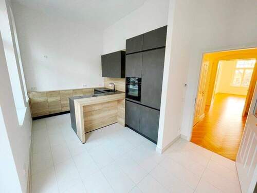 Küche mit Einbauküche - 