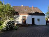 Seitenansicht - Charmantes Ein-Zweifamilienhaus mit großem Garten in Bremen-Schönebeck - viel Potenzial!