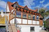 Haus mit Gastronomie in Eschau - BERK Immobilien - Besonderes EFH mit großem Wintergarten und Garten in Eschau-Sommerau zu verkaufen