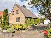 Haus zu verkaufen in Bremen Arsten – H & T Immobilien - Arsten! - Gepflegtes Einfamilienhaus mit Garten und Garage!