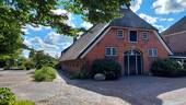Straßenansicht - Mehrfamilienhaus, Wohnhaus mit 232,00 m² in Bockhorn zum Kaufen