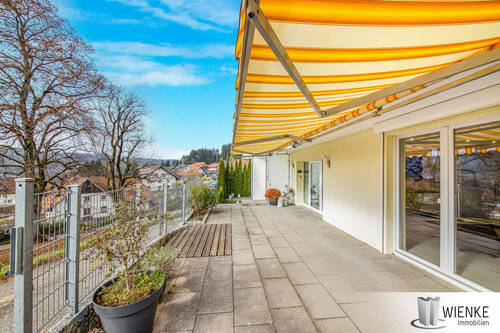 Wienke_Immobilien_Makler_Waldshut_Tiengen_Hochrhei - Sanierte Eigentumswohnung mit eigenem Garten und Terrasse, Einbauküche und Kaminofen inklusive