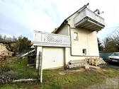 Südseite mit Garage, Balkon und Dachterrasse - 