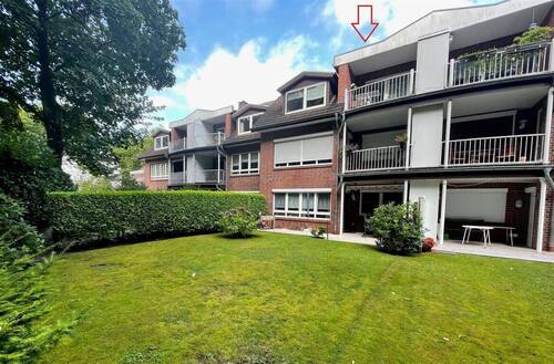 Außenansicht - Hude-Süd: Renovierte 3-Zimmer-Maisonettewohnung mit Balkon und Carport