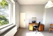 1 OG links Zimmer - 