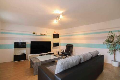 Wohnzimmer - 5 Zimmer Einfamilienhaus in Bad Nauheim