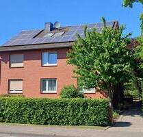 Ahlen Dolberg, ein vielfältig nutzbares 3-Familienhaus mit großem Garten, Vollkeller und 3 Garagen.