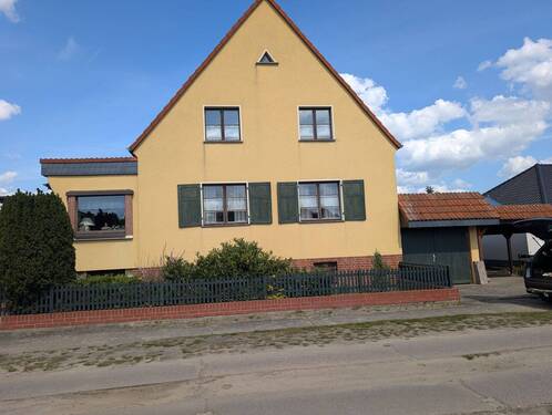 Vorderansicht mit Verranda.jpg - 4 Zimmer Einfamilienhaus zum Kaufen in Milower Land