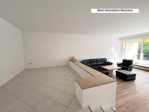 Ansicht Split Level - Lichtdurchflutete Erdgeschoss-Wohnung mit Garten & zwei Terrassen in ruhiger Lage