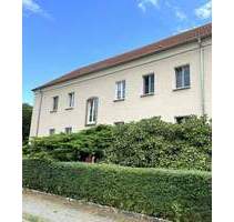 Attraktive Mehrfamilien- Doppelhaushälfte in grüner Stadtrandlage von Pirna!