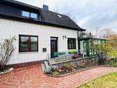 Hausansicht - Charmantes Einfamilienhaus mit Wintergarten, Garage und schönem Grundstück!