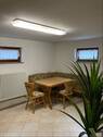 Sitzecke / Küche im Einliegerapartment - Souterrain - 