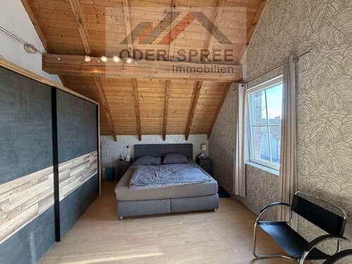 Schlafzimmer im Dachgeschoss - 
