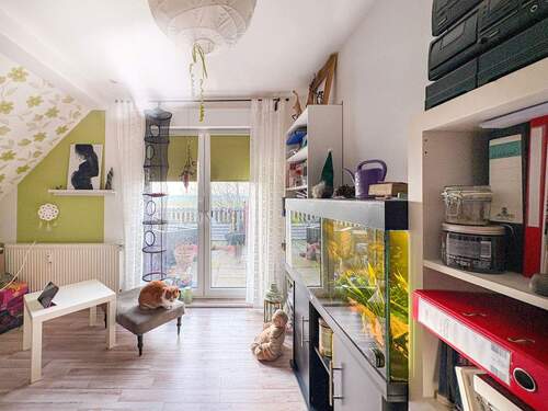 Schlafzimmer mit Zugang zur Dachterrasse - 