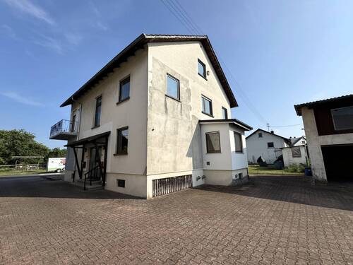 Hausansicht_Seite - 1 Zimmer Mehrfamilienhaus, Wohnhaus in Graben-Neudorf