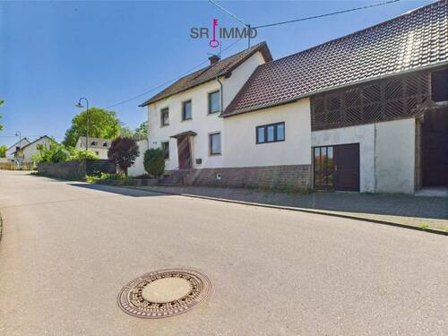 Bild 1 - Modernisiertes Einfamilienhaus mit separatem Gästehaus auf großzügigem Grundstück