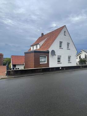 Vorderansicht links - 7 Zimmer Einfamilienhaus zum Kaufen in Lübbecke