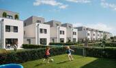 Modernes Kettenhaus mit Platz für Ihre Lieblingsmomente im eigenen Garten - 