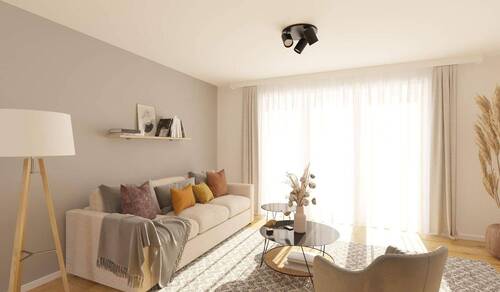 Lichtdurchfluteter Wohnbereich dank bodentiefer Fenster - 