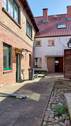 Hintere Ansicht I Innenhof - Hier wartet ein besonderes Haus mit altem Charm und viel Potenzial auf neue Eigentümer