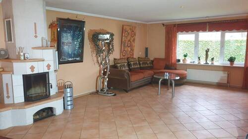 Wohnzimmer mit Kaminofen - 