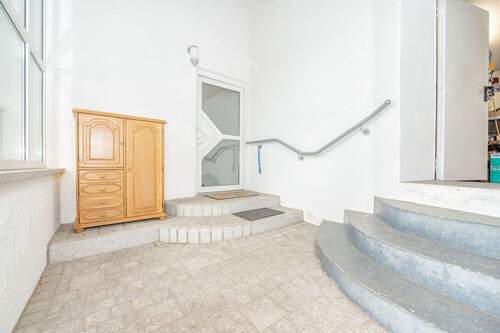 Windfang zwischen Garage und Wohnhaus - 