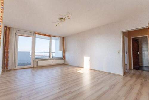 Das Wohn-/Esszimmer mit Blickrichtung Loggia - 