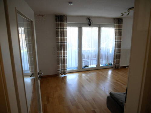 Wohnzimmer Blick Terrasse - 2 Zimmer Etagenwohnung zum Kaufen in Tostedt