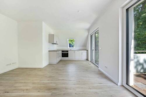 Wohn-/ Essbereich mit Küche - 